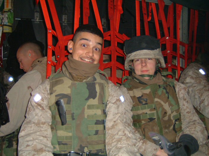 An acquaintance and I flying to or either back from Qatar, December 2004.  